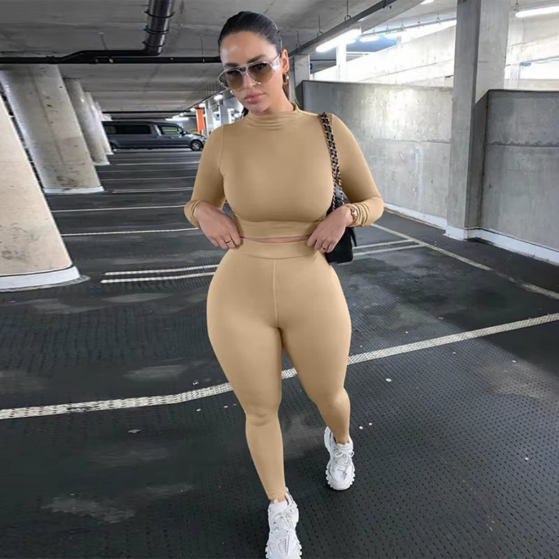 Elevate Your Workout Wardrobe with Our Stylish Women's 2-Piece Fitness Set - Long Sleeve Crop Top & Bodycon Leggings